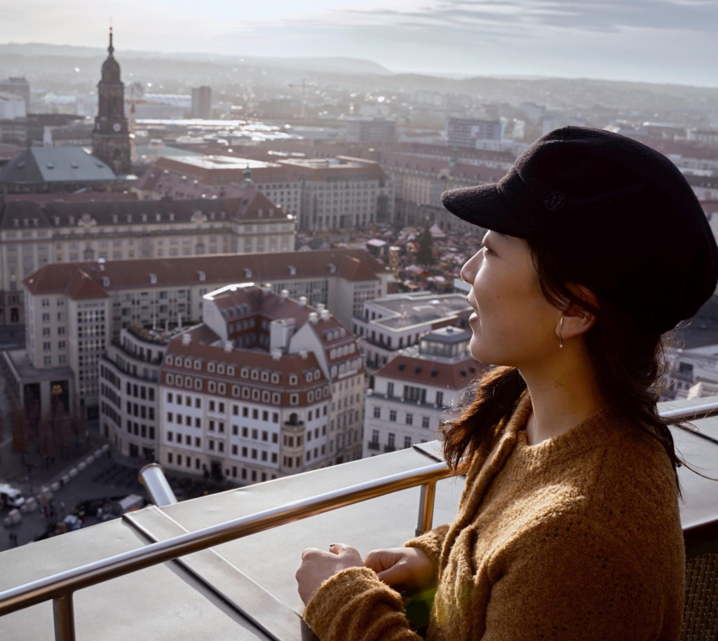 girl on top of a building in dresden