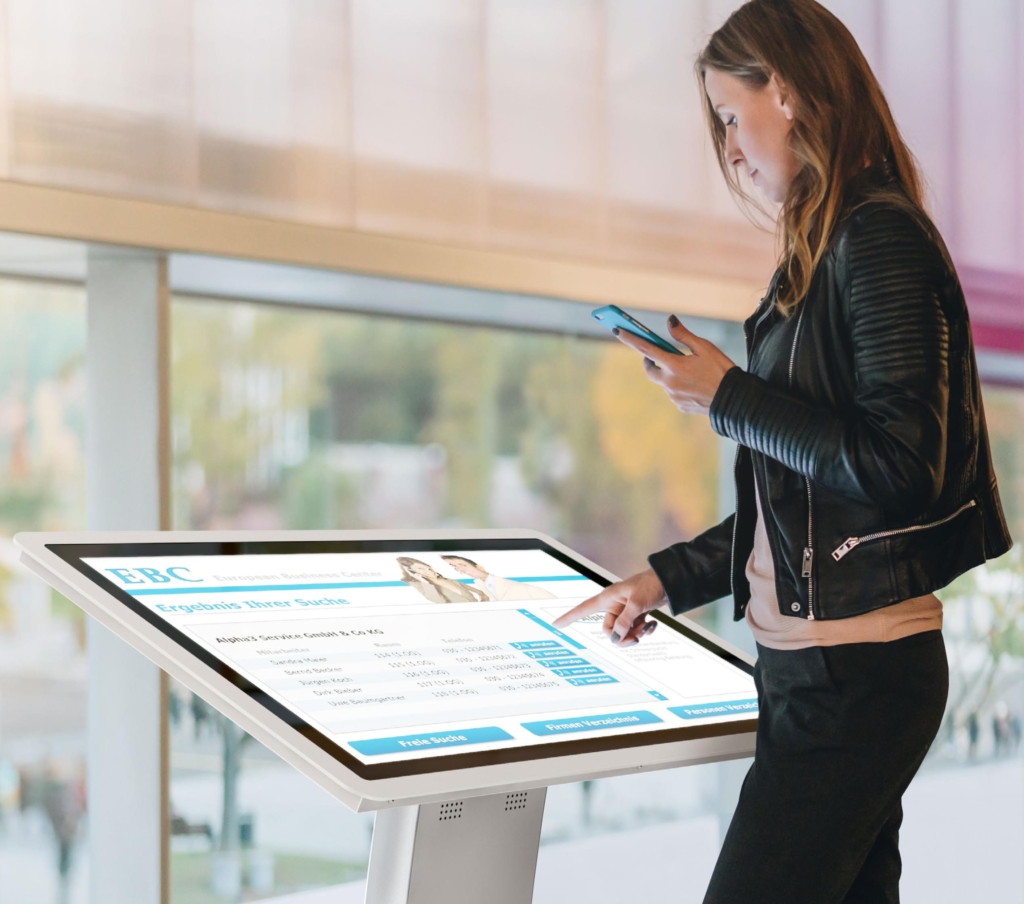 woman handling a multi touch table