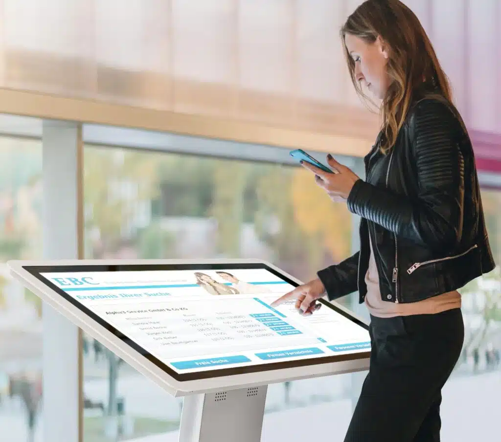woman handling a multi touch table